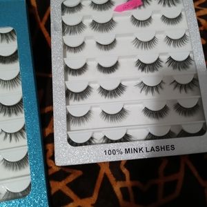 eye lashes and makeup brushes
